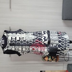 Desigual dress with eclectic pattern, pop of red, and artistic design
